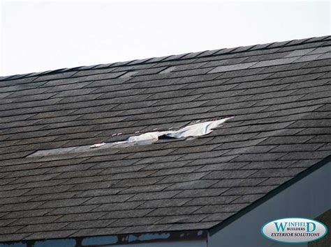 Wind Damage to Asphalt Shingles: Common Misconceptions - Winfield Builders