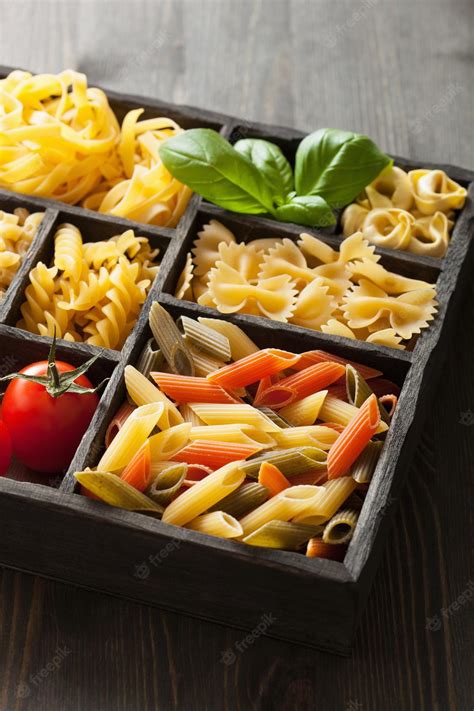 Premium Photo | Various pasta in black wooden box