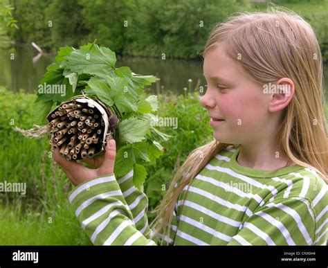Girl with insect hi-res stock photography and images - Alamy