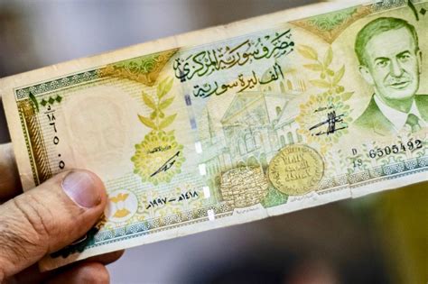 Syria's Assad raises penalty on foreign currency use to seven years ...