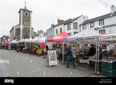 Keswick Market in the Lake District Cumbria UK with market stalls on an overcast day in winter ...