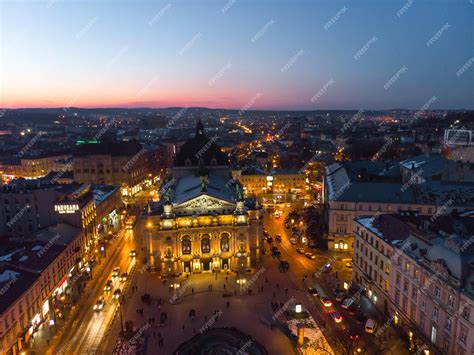 Premium Photo | Aerial view of city in night time streets in car lights