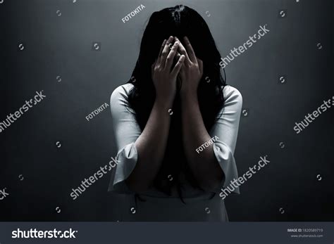 Scared Woman On Dark Background Stock Photo 1820589719 | Shutterstock