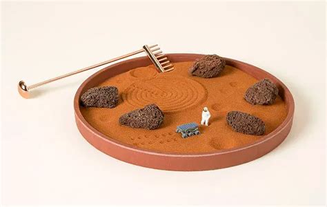 A Martian Zen Garden with Red Sand and a Tiny Astronaut