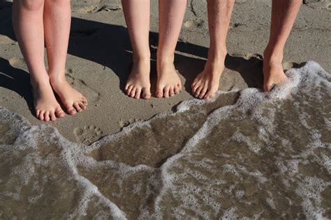 Free Images : hand, beach, sea, sand, rock, shoe, sun, hiking, feet, view, leg, spring, pebble ...