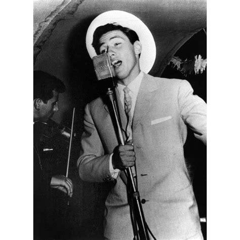 A young Silvio Berlusconi pictured singing on a cruise ship in the ...