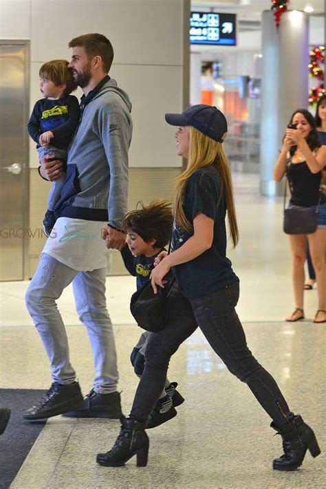 Shakira and Gerard Pique arrive at the Miami airport with their kids ...