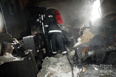 Firefighter In A Burnt-out House Photograph by Michael Donne/science ...