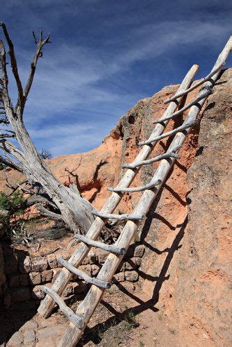 Wooden ladder ascending to Anasazi Indian cliff dwellings in Tsankawi Ruins, Bandelier National ...