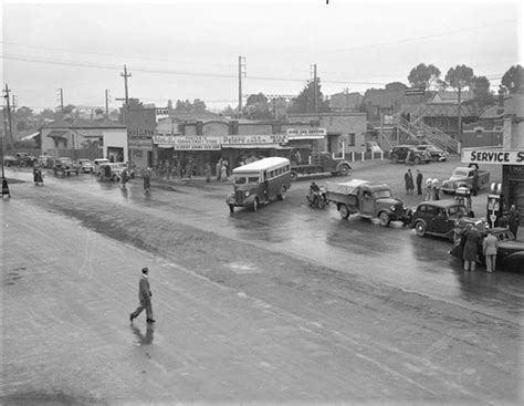 RINGWOOD (Vic) 1951 ~ Cnr Maroondah H'way and Melbourne St. Outside Ringwood Railway station and ...