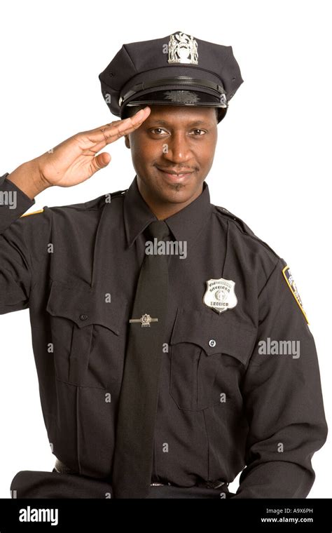 Police officers saluting hi-res stock photography and images - Alamy