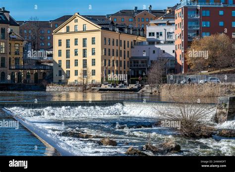 Motala river and the old industrial landscape in Norrkoping during early spring. Norrkoping is a ...