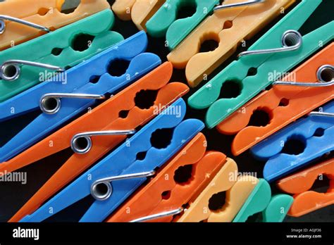 Colored pegs Stock Photo - Alamy