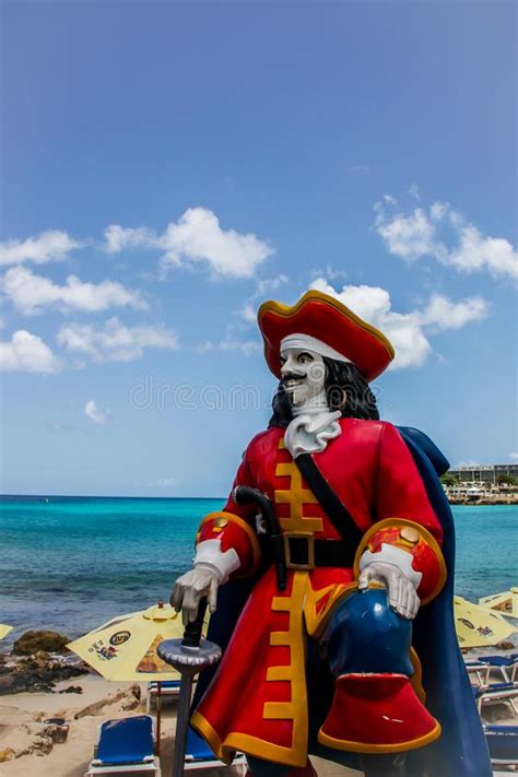 Captain Morgan Statue Standing and Looking Over Maho Bay Beach ...