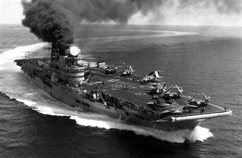 Audacious-class aircraft carrier HMS Eagle gives of smoking signals ...