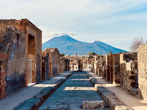 Mount Vesuvius rising above the ancient ruins of Pompeii : r/pics