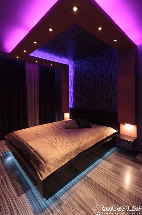 Fancy looking hotel room with a printed stretch ceiling and RGB led lighting., [post_categori ...
