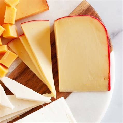 Dutch Gouda Cheese From Holland - Whole Wheel (10 pound) - hits the midpoint of creaminess in ...