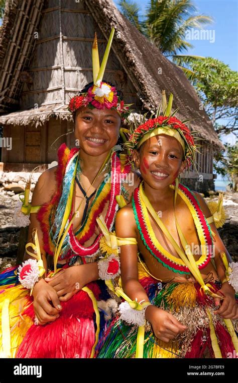 Girl and boy decorated for traditional bamboo dance, Yap Island, Yap ...