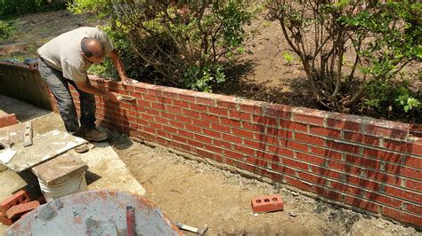 Brick Retaining Wall » AJ’S MASONRY » RENOVATION. RESTORATION. REPAIR.