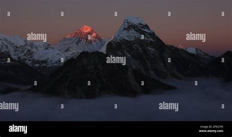 Peak of Mount Everest at sunset Stock Photo - Alamy