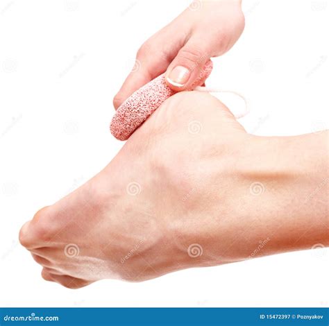 Pumice stone on feet. stock image. Image of barefoot - 15472397