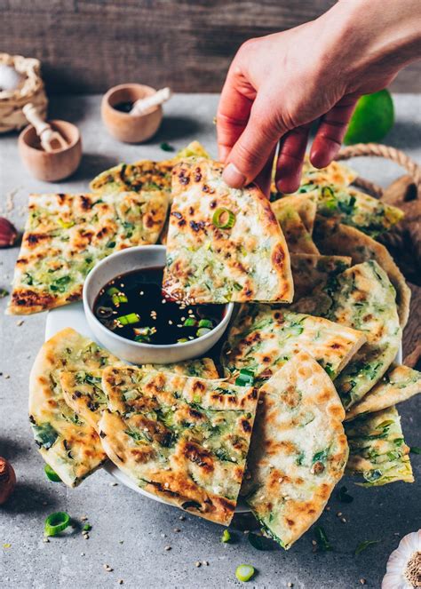 These 3-ingredient Vegan Scallion Pancakes are a crispy pan-fried Chinese flatbread which are ...