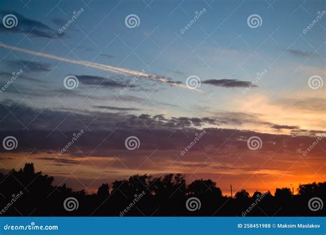 The Morning Glow Illuminates the Clouds on a Beautiful Colorful Sky ...