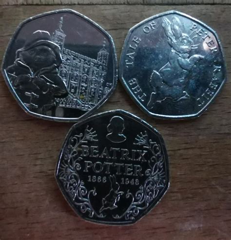 Paddington Bear and Peter Rabbit 50p coins : r/britpics