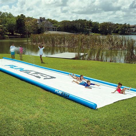 Gigantic Backyard Water Slide | Giant slip and slide, Water slides, Slip and slide