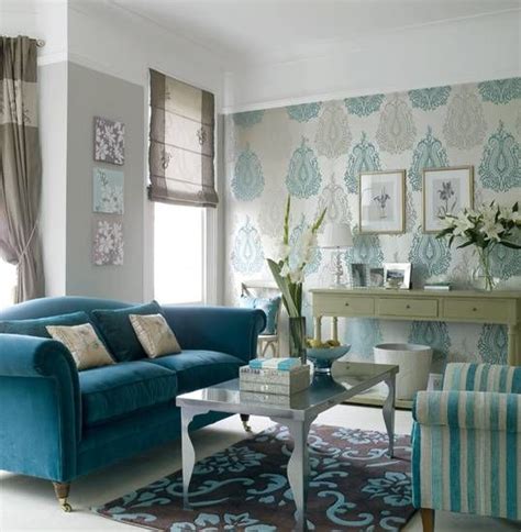 Turquoise sofa, rug, and wallpaper for modern blue living room | Living room turquoise ...