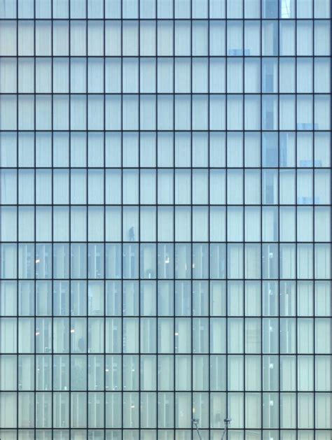 Glass Building Facade with Green Texture