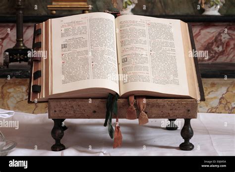 Open Bible on an altar Stock Photo - Alamy