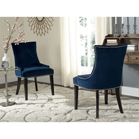 Low sloped arms and a slight hourglass shape to the seat back define this set of two dining ...