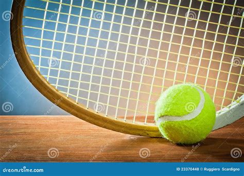 Sports Equipment.tennis And Racket On Wood Royalty Free Stock Photos - Image: 23370448