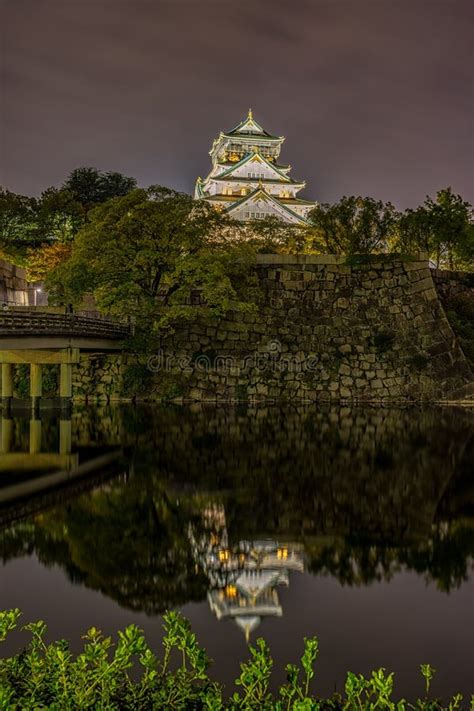 Night View of Osaka Castle Reflecting in Water Moat in Osaka, Japan Stock Image - Image of ...