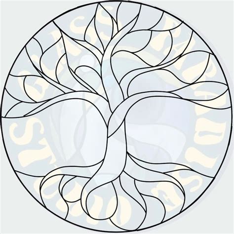 a circular stained glass window with a tree in the center