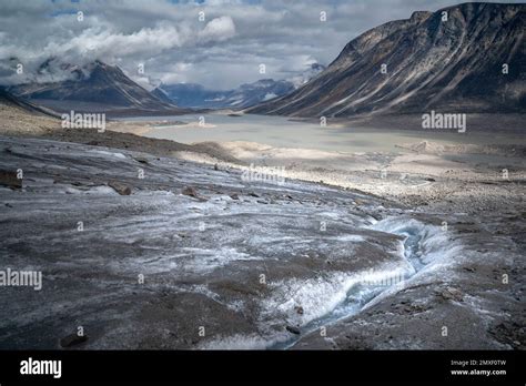 The tongue of Tupermit Glacier in Akshayuk Pass. Auyuittuq National ...