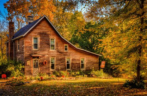 Log Cabin In The Fall Photograph by Keith Allen