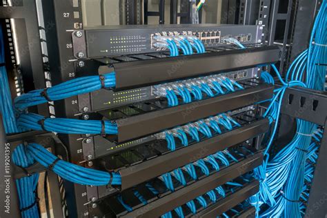 Network switch and ethernet cables in rack cabinet, Computer and ...