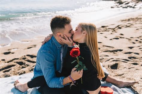 Free Photo | Loving people kissing on beach