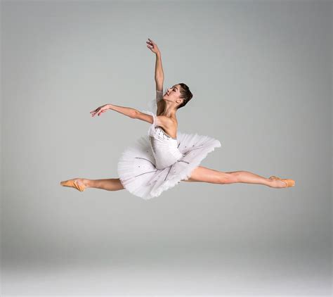 Ballerina Performing Grand Jeté by Nisian Hughes