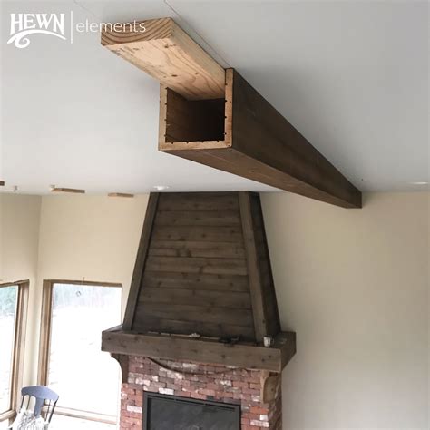 Easy DIY faux ceiling beam install | Faux ceiling beams, Ceiling beams living room, Ceiling beams