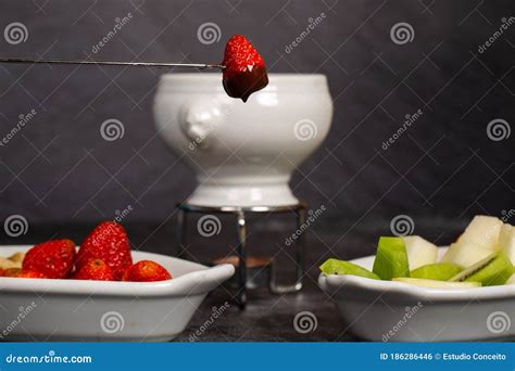 Chocolate Fondue Served with Fruit Stock Photo - Image of eating, apple ...