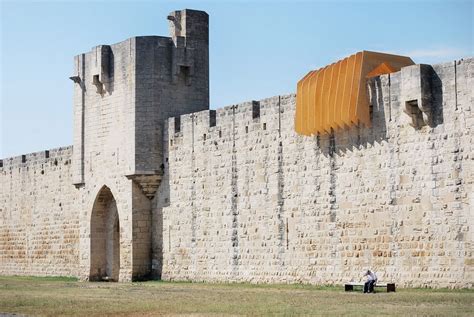 NAS Architecture installs wooden "vortex" over medieval wall