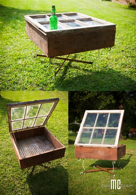 an old window turned into a coffee table in the grass, and then ...