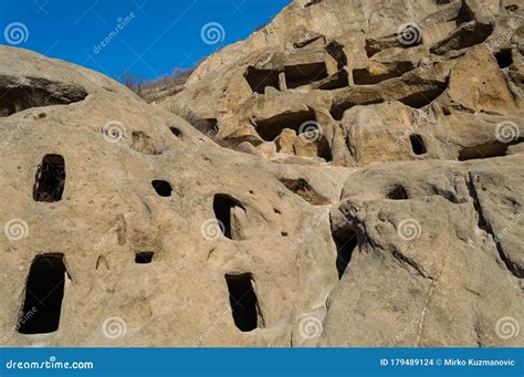 Ancient Cliff Dwellings Of Guyaju Caves In China Royalty-Free Stock Photography | CartoonDealer ...