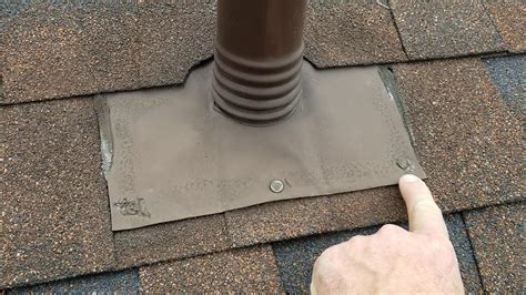 Sealing nail heads on roof - Brian Richards - YouTube