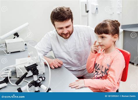 Orthoptics. Pleoptics. Doctor Explains How To Use Ophthalmic Equipment. Royalty-Free Stock Image ...