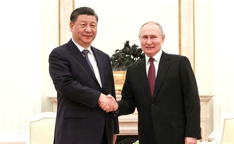 Putin flaunts alliance with Xi as 'dear friends' meet in Kremlin ...